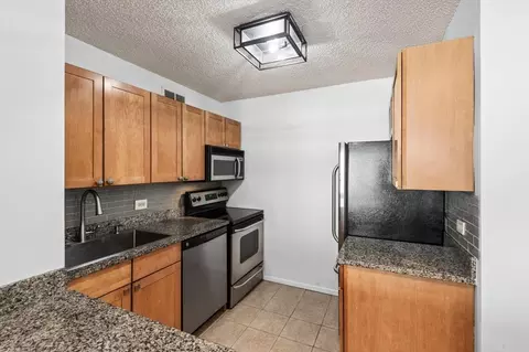 Kitchen - 30 E Huron St #908, Chicago, IL 60611 photo 2 of 3