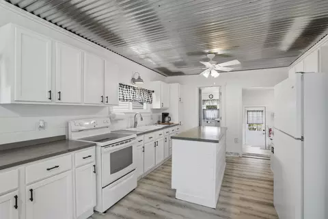 Kitchen - 301 N Yates St, Alpha, IL 61413 photo 2 of 3