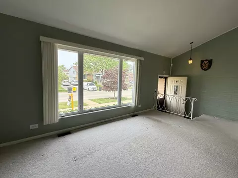 Living - 8945 N Lyons St, Des Plaines, IL 60016 photo 2 of 2