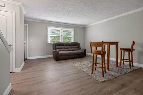 Living - 105 E Lincoln St #D, Normal, IL 61761 photo 2 of 2