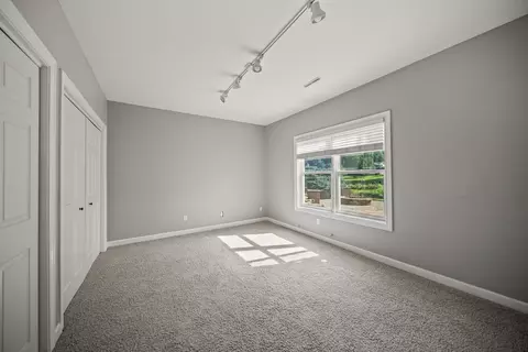 Bedroom - 307 S Tombergs Dr, Eldridge, IA 52748 photo 2 of 5