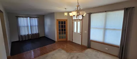 Living - 697 Periwinkle Ln, Aurora, IL 60504 photo 2 of 3
