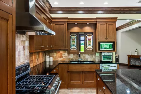 Kitchen - 606 Harvey Rd, Downs, IL 61736 photo 4 of 10