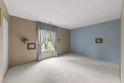 Bedroom - 1608 Thames Ct #A, Wheaton, IL 60189 photo 3 of 5