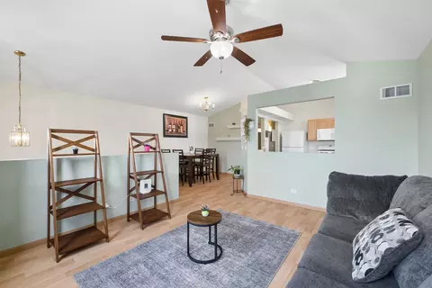Living - 814 Symphony Dr, Aurora, IL 60504 photo 1 of 2