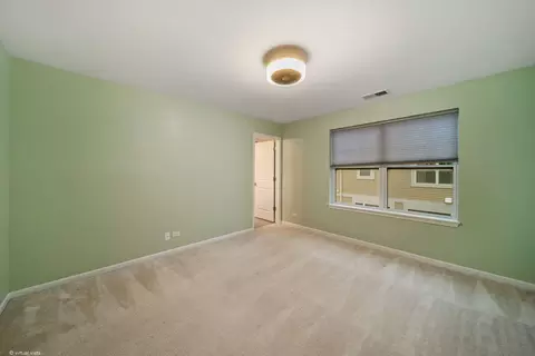 Bedroom - 775 Lee St, Des Plaines, IL 60016 photo 2 of 4