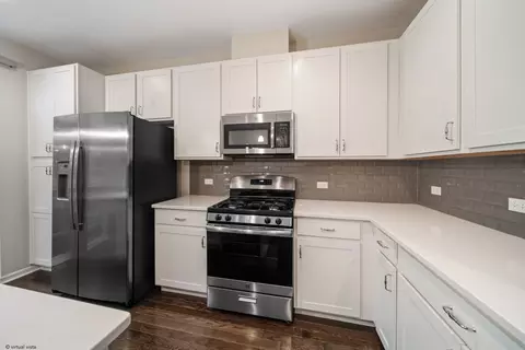 Kitchen - 775 Lee St, Des Plaines, IL 60016 photo 3 of 4