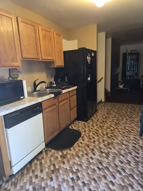 Kitchen - 920 E 153rd St, Harvey, IL 60426 photo 2 of 3