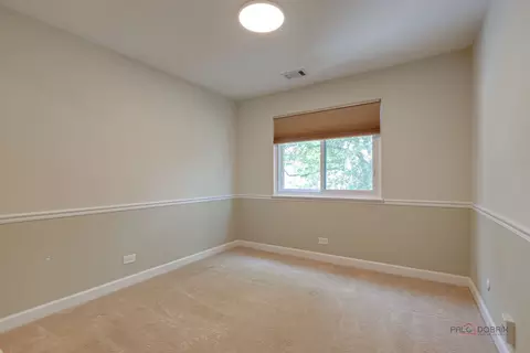 Bedroom - 585 Williamsburg Ct #D2, Wheeling, IL 60090 photo 3 of 4