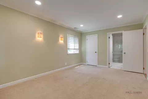 Bedroom - 585 Williamsburg Ct #D2, Wheeling, IL 60090 photo 2 of 4