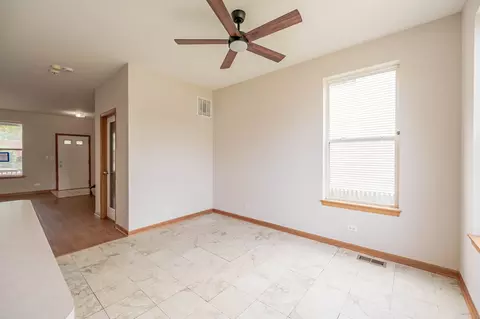 Living - 118 E 107th St, Chicago, IL 60628 photo 3 of 3