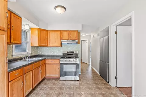 Kitchen - 7320 W 58th St, Summit, IL 60501 photo 2 of 2