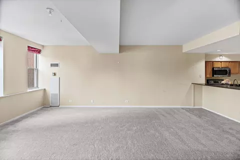Living - 40 E 9th St #1907, Chicago, IL 60605 photo 7 of 11