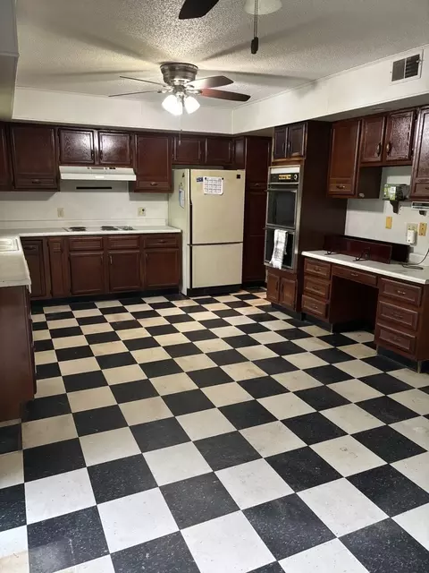 Kitchen - 301 S 2nd St, Walnut, IL 61376 photo 2 of 2