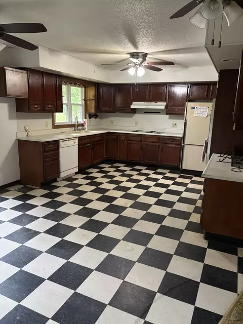 Kitchen - 301 S 2nd St, Walnut, IL 61376 photo 1 of 2