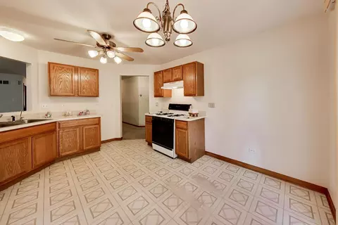Kitchen - 231 Hillcrest Ln, Steger, IL 60475 photo 2 of 3