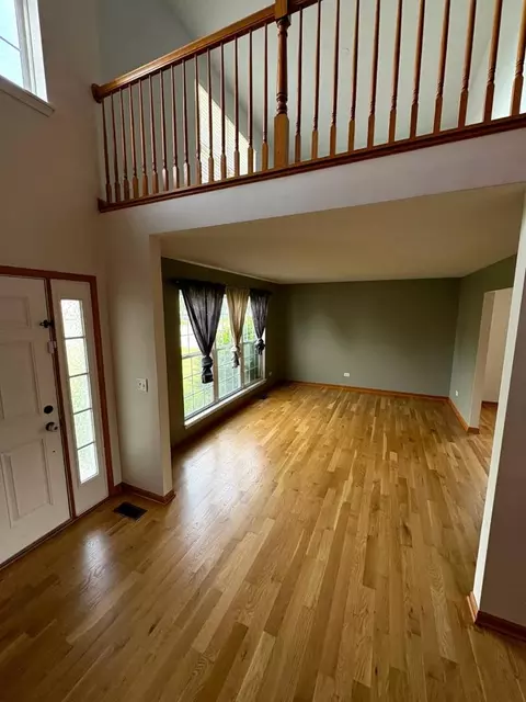 Living - 1301 Burns Ct, Minooka, IL 60447 photo 1 of 2