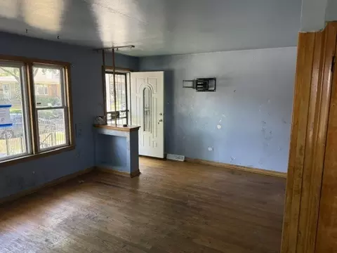 Living - 658 E 87th Pl, Chicago, IL 60619 photo 1 of 1