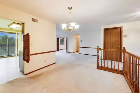 Living - 245 Windsor Ln #C, Willowbrook, IL 60527 photo 4 of 4