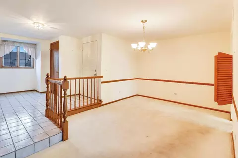 Living - 245 Windsor Ln #C, Willowbrook, IL 60527 photo 3 of 4