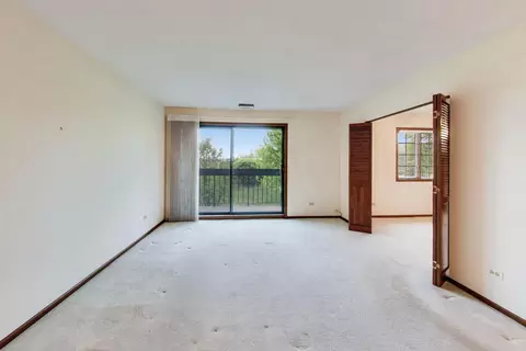 Living - 245 Windsor Ln #C, Willowbrook, IL 60527 photo 1 of 4