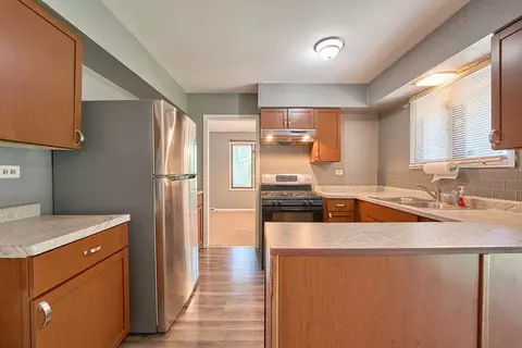 Kitchen - 385 E 162nd St, Harvey, IL 60426 photo 2 of 2