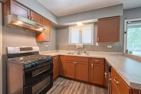 Kitchen - 385 E 162nd St, Harvey, IL 60426 photo 1 of 2