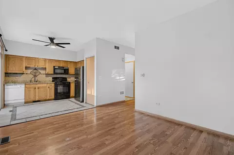 Living - 1434 Levato Ln, Minooka, IL 60447 photo 5 of 10