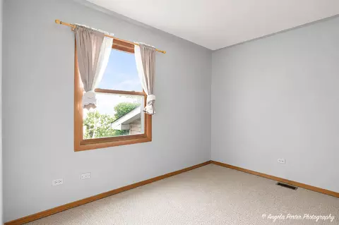 Bedroom - 2494 Forest View Rd, Lindenhurst, IL 60046 photo 2 of 4