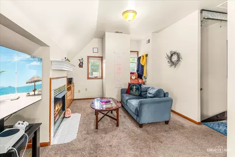 Living - 386 E Chicago St, Elgin, IL 60120 photo 2 of 2
