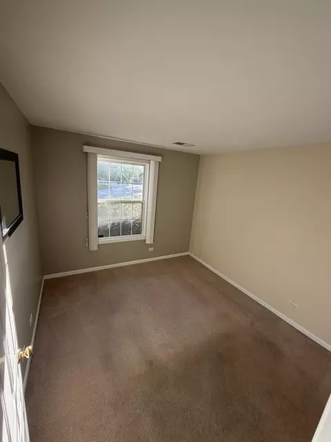 Bedroom - 205 Ashbury Ln E #E3, Roselle, IL 60172 photo 2 of 2