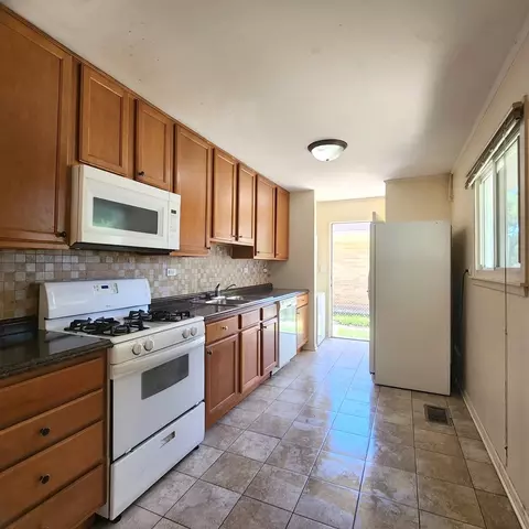 Kitchen - 245 E Dennis Rd, Wheeling, IL 60090 photo 2 of 2