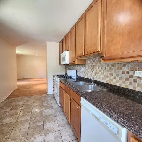 Kitchen - 245 E Dennis Rd, Wheeling, IL 60090 photo 1 of 2