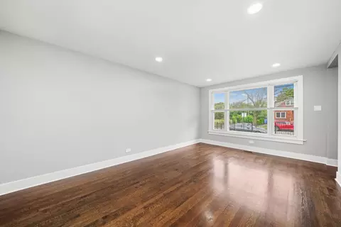 Living - 819 E 98th Pl, Chicago, IL 60628 photo 3 of 4