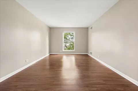 Living - 5300 Carriageway Dr #207, Rolling Meadows, IL 60008 photo 9 of 11