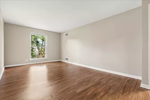 Living - 5300 Carriageway Dr #207, Rolling Meadows, IL 60008 photo 10 of 11