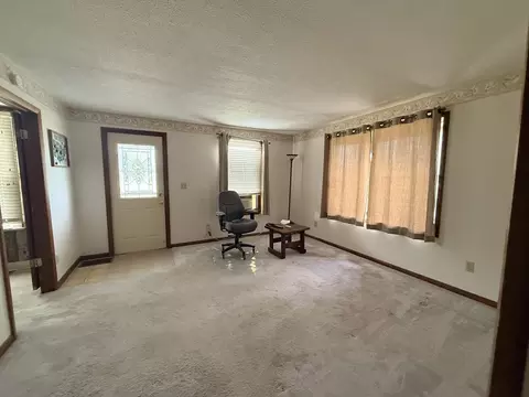 Living - 1 E Main St, Amboy, IL 61310 photo 2 of 2