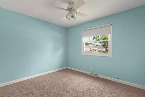 Bedroom - 406 S 8th St, Eldridge, IA 52748 photo 5 of 7