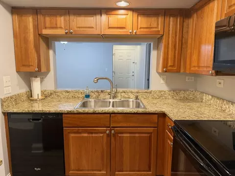 Kitchen - 19 Foxcroft Rd #103, Naperville, IL 60565 photo 3 of 3