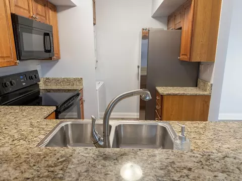 Kitchen - 19 Foxcroft Rd #103, Naperville, IL 60565 photo 1 of 3
