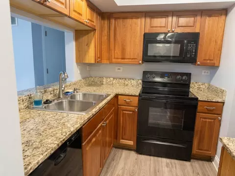 Kitchen - 19 Foxcroft Rd #103, Naperville, IL 60565 photo 2 of 3