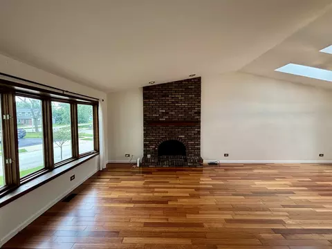 Living - 1450 Sturbridge Ct, Hoffman Estates, IL 60192 photo 5 of 9