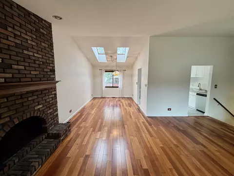 Living - 1450 Sturbridge Ct, Hoffman Estates, IL 60192 photo 4 of 9