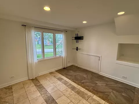 Living - 1450 Sturbridge Ct, Hoffman Estates, IL 60192 photo 8 of 9