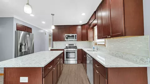 Kitchen - 923 E 158th St, Dolton, IL 60419 photo 2 of 3