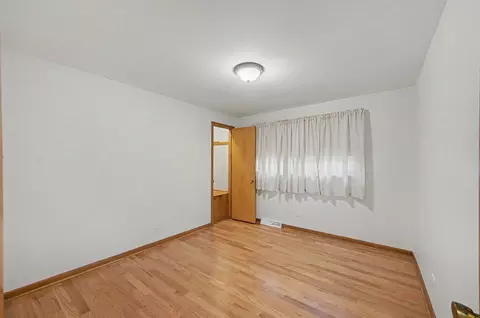 Bedroom - 11543 S Ewing Ave, Chicago, IL 60617 photo 3 of 7