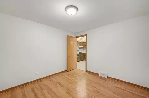 Bedroom - 11543 S Ewing Ave, Chicago, IL 60617 photo 2 of 7