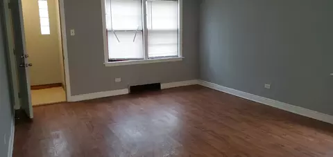 Living - 165 E 119th St, Chicago, IL 60628 photo 3 of 4