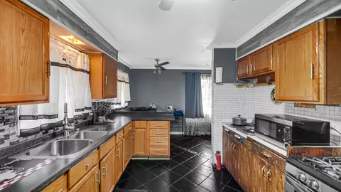 Kitchen - 1228 E 151st St, Dolton, IL 60419 photo 2 of 2