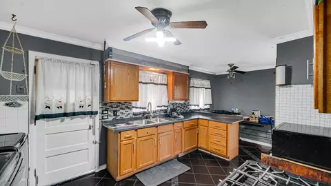 Kitchen - 1228 E 151st St, Dolton, IL 60419 photo 1 of 2